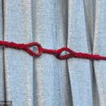 detail-corde-fil-rouge-empaquetage-arc-de-triomphe-paris-christo